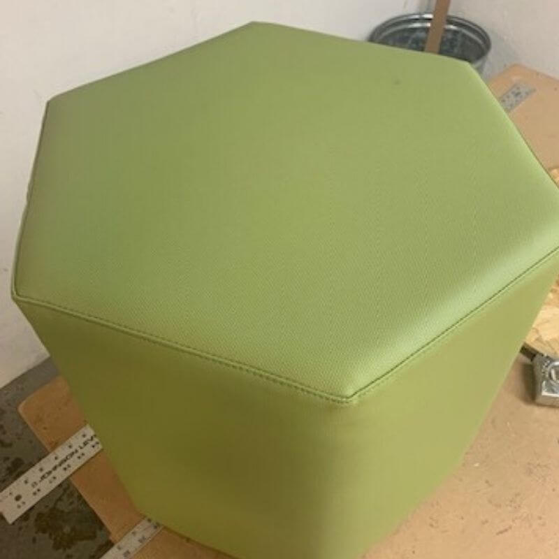 https://www.greencleandesigns.com/wp-content/uploads/2019/10/vinyl-hexagon-ottoman-greencleandesigns.com_.jpg
