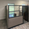 Enclosed cubicle with door
