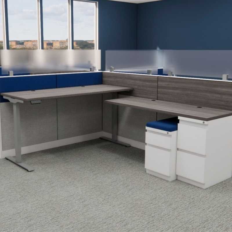 Modern cubicle cluster with frosted glass, blue fabric panels, wood grain laminate, and sit-stand desks