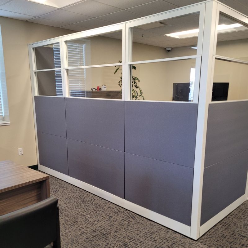 Storey County cubicles with doors and glass top panels, corner view