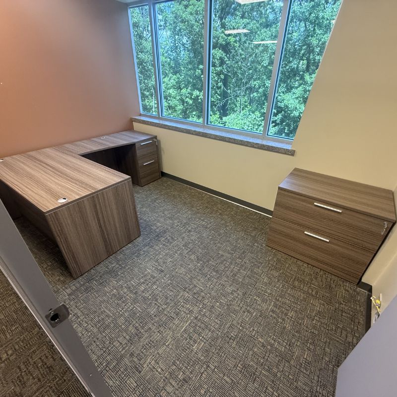 L shaped desk with lateral file cabinet installed in hospital private office in Columbia Missouri