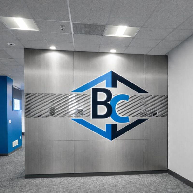 custom metal divider wall with the company logo